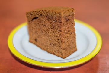 Gingerbread cake on plate.