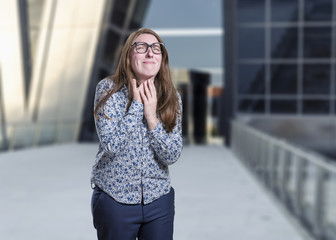 Pretty young happy business woman throat pain with glasses