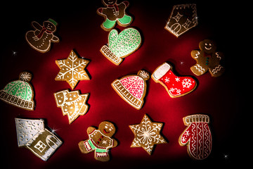 Gingerbread cookies on  red background.
