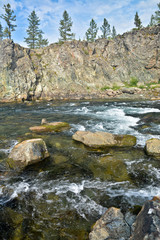 Naklejka na ściany i meble River rapids in the Polar Urals.