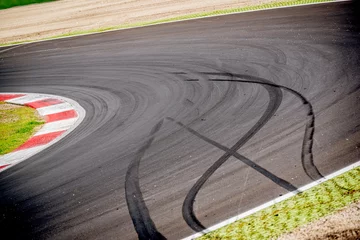 Fototapeten Motorsport racing track and car slammed brakes sign © fabioderby