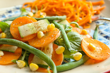 Plate with tasty carrot salad, closeup
