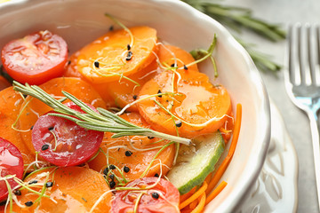 Dish with tasty carrot salad, closeup