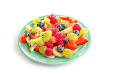 Plate with yummy fruit salad isolated on white