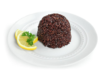 Plate with cooked rice ball on white background