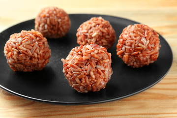 Cooked rice balls on plate