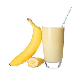 Ripe banana and glass of tasty smoothie on white background