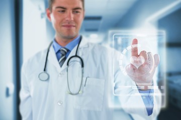 Composite image of doctor touching an digital screen 3d