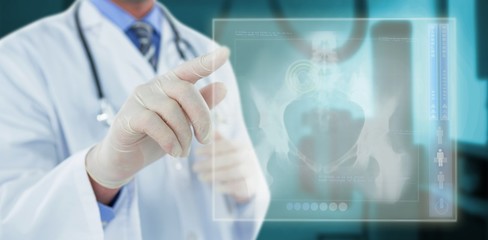 Composite image of doctor touching an digital screen 3d
