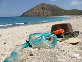 At the beach in Lombok with diving glasses, sunglasses and hat
