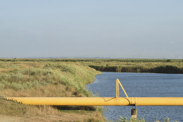 The gas pipeline through the small river