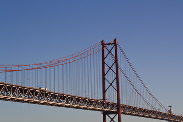 Cars crossing red bridge to south bay, and King Christ in the background