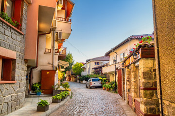 Fototapeta na wymiar City landscape - old streets and homes in balkan style, town of Sozopol on the Black Sea coast in Bulgaria