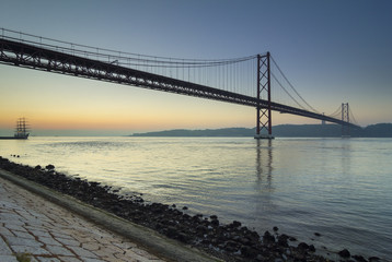 Tagus river and 25th April bridge at dawn