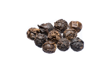Black peppercorn against isolated on a white background