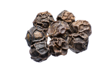 Black peppercorn against isolated on a white background