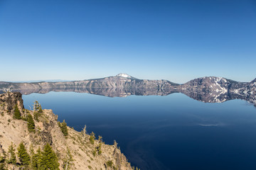 Fototapeta na wymiar Crater lake perfect reflection in Oregon, USA