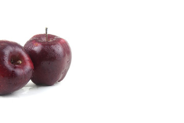 Red apples are delicious on a white background.