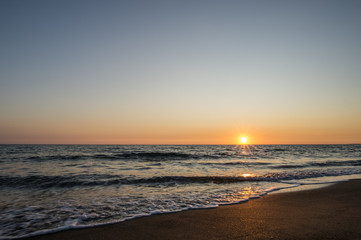 Fototapeta na wymiar Beautiful sunset over the mediterranean sea. Sabaudia, Italy.