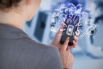 Composite image of close-up of businesswoman using mobile phone