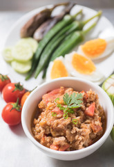 Northern Thai food (Nam Prik Ong) with vegetables and boiled egg,spicy tomato with pork,red chili dip,Northern Thai dipping sauce