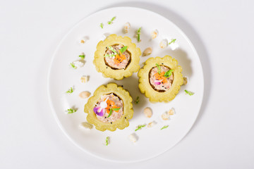 Boiled bitter gourd with pork decorated with carrot and flower,food styling.Top view of food