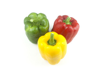 Bell pepper Red yellow and green fresh delicious on a white background.