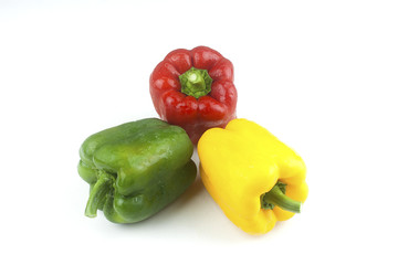 Bell pepper Red yellow and green fresh delicious on a white background.