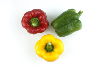 Bell pepper Red yellow and green fresh delicious on a white background.