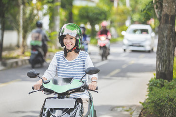 beautiful woman riding motorcycle