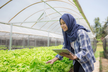 female farmer with tablet