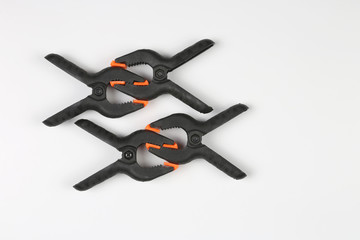 Obraz premium four black pegs on a white background