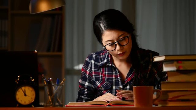 bored female college student studying