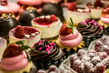Fotobehang desserts in bakery case © Landon