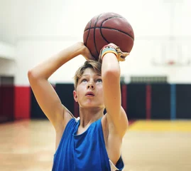 Foto op Plexiglas Young basketball player shoot © Rawpixel.com