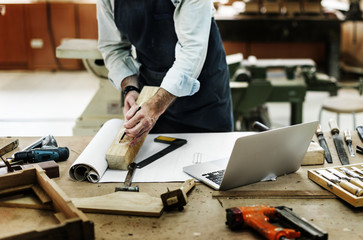 Craftsman working in a wood shop