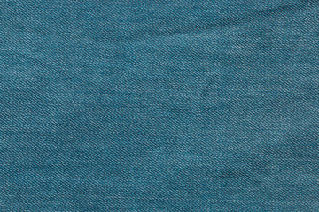 Blue background, denim jeans background. Jeans texture, fabric.