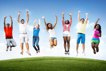 Obraz premium Happy diverse young people jumping