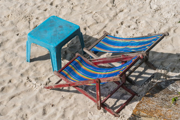 chair on beach of relaxing lake