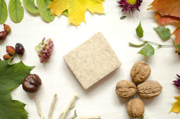 Natural organic cosmetics. Hand Made soap on the white wooden background.