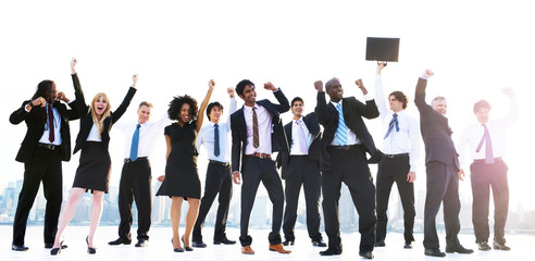 Obraz premium Group of diverse business people with raised arms