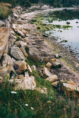 Obraz premium Baltic sea coastline with cliff and stones