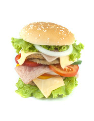 Pork hamburger Homemade with grilled bacon contains vegetables, cheese, lettuce, onion, chilli, spices in a wooden dish isolated on white backgroud