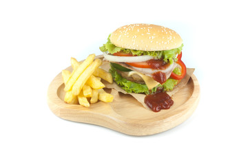 Pork hamburger Homemade with grilled bacon contains vegetables, cheese, lettuce, onion, chilli, spices in a wooden dish isolated on white backgroud
