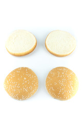 Fototapeta na wymiar Bun or burger bread with sesame cut isolated on white background
