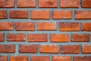 Obraz premium Old red brick wall texture for background.Clay bricks for building construction.