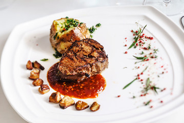 steak with baked potato