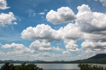 Beautiful view of  Lamtakong  reservoir in Nakhon Ratchasima provine in Thailand sky  with beautiful clouds ,blue sky  and mountains background.