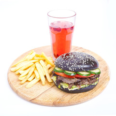 black burger with fried and compote