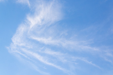 Fantastic soft white clouds against blue sky